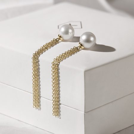 Earrings with purple gemstone